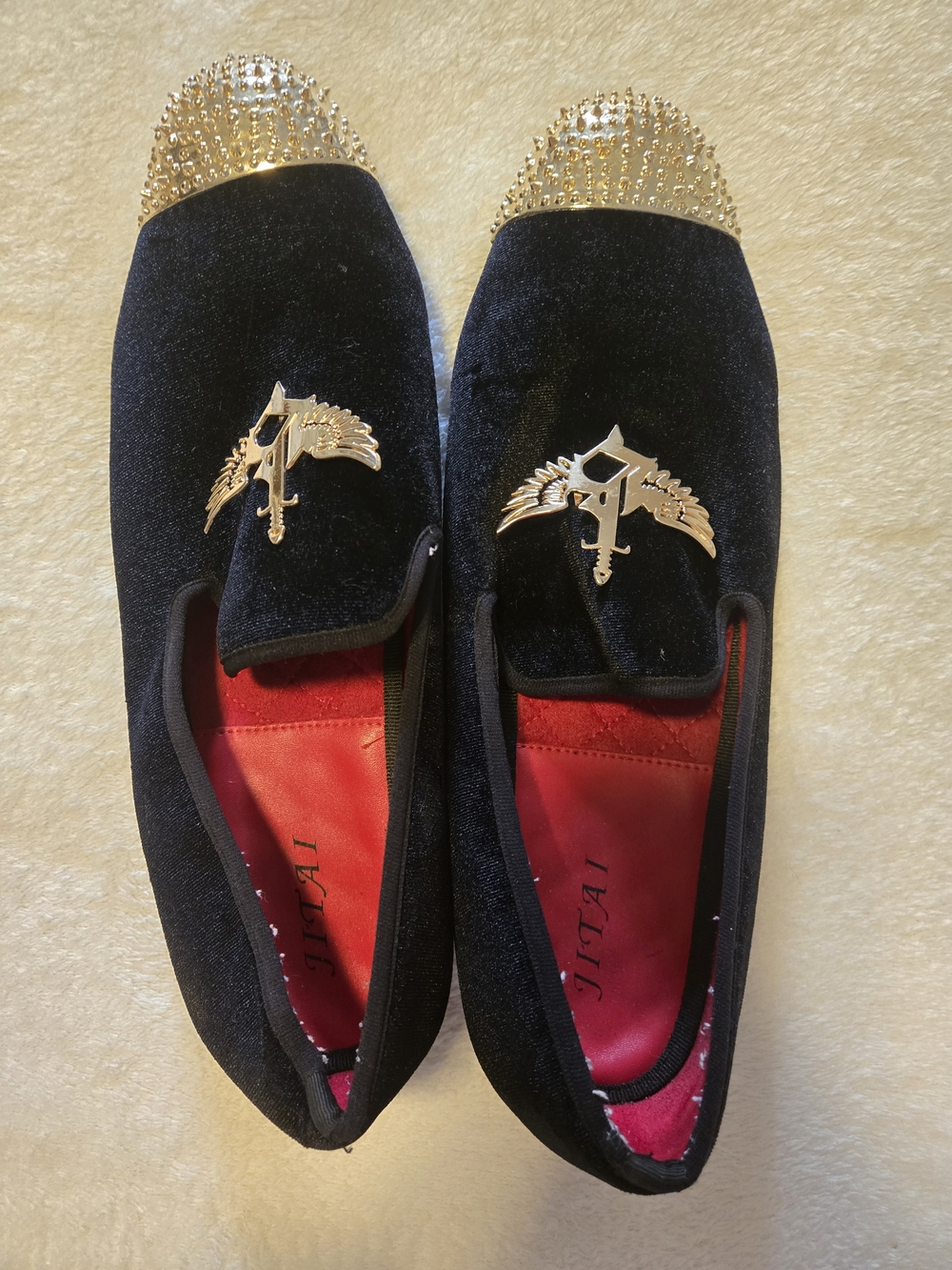 JiTai Black Velvet Slip-Ons with Gold Studded Toe Caps and Crest Emblem